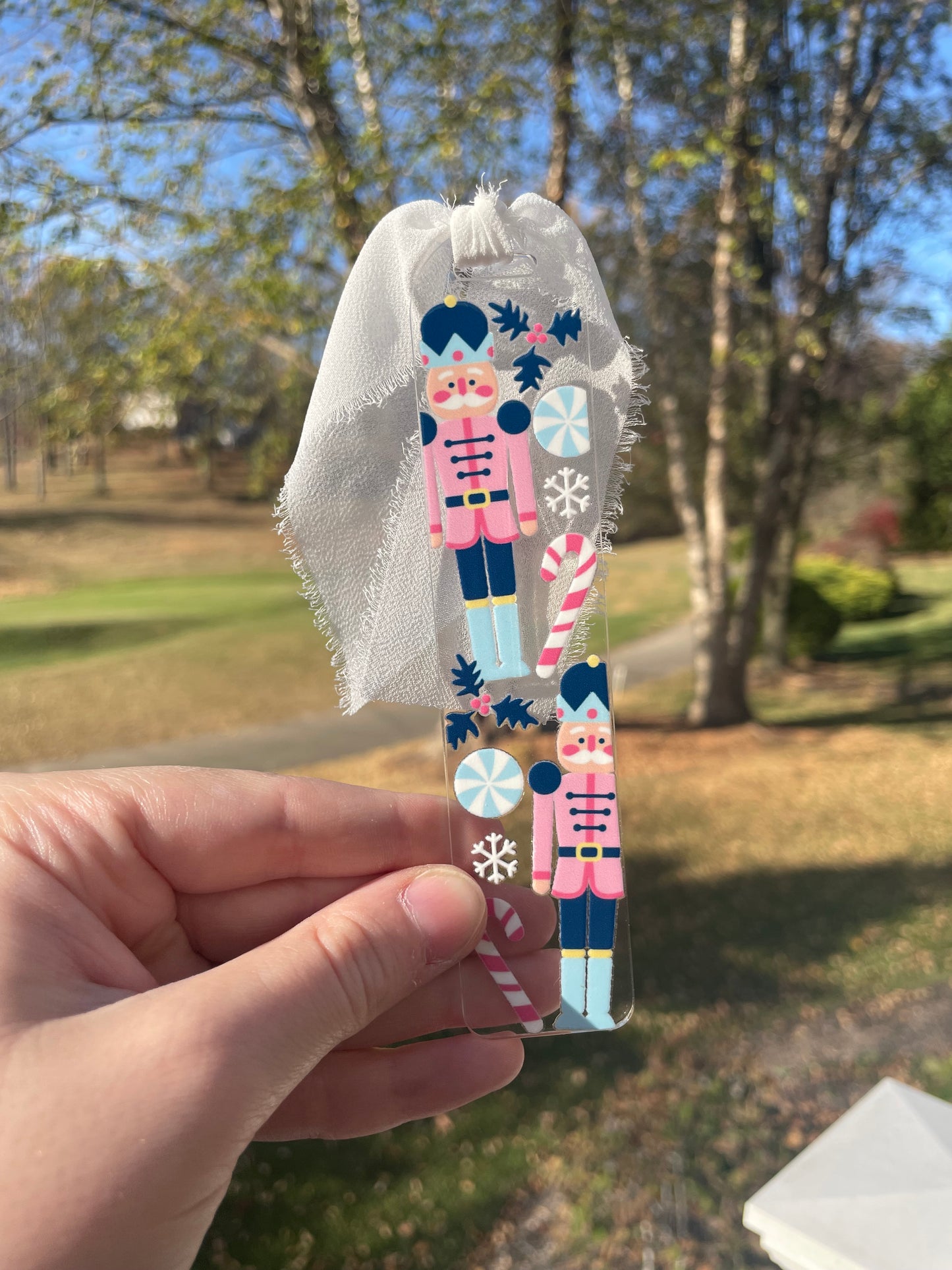 Blue Nutcrackers Holiday Clear Acrylic Bookmark with Chiffon Ribbon