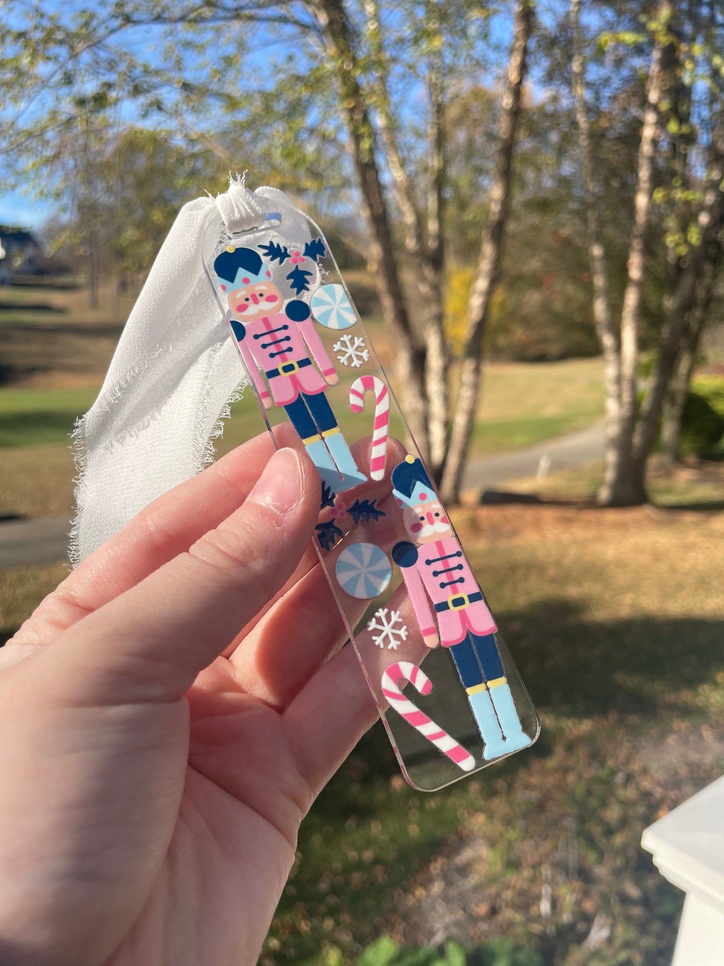 Blue Nutcrackers Holiday Clear Acrylic Bookmark with Chiffon Ribbon
