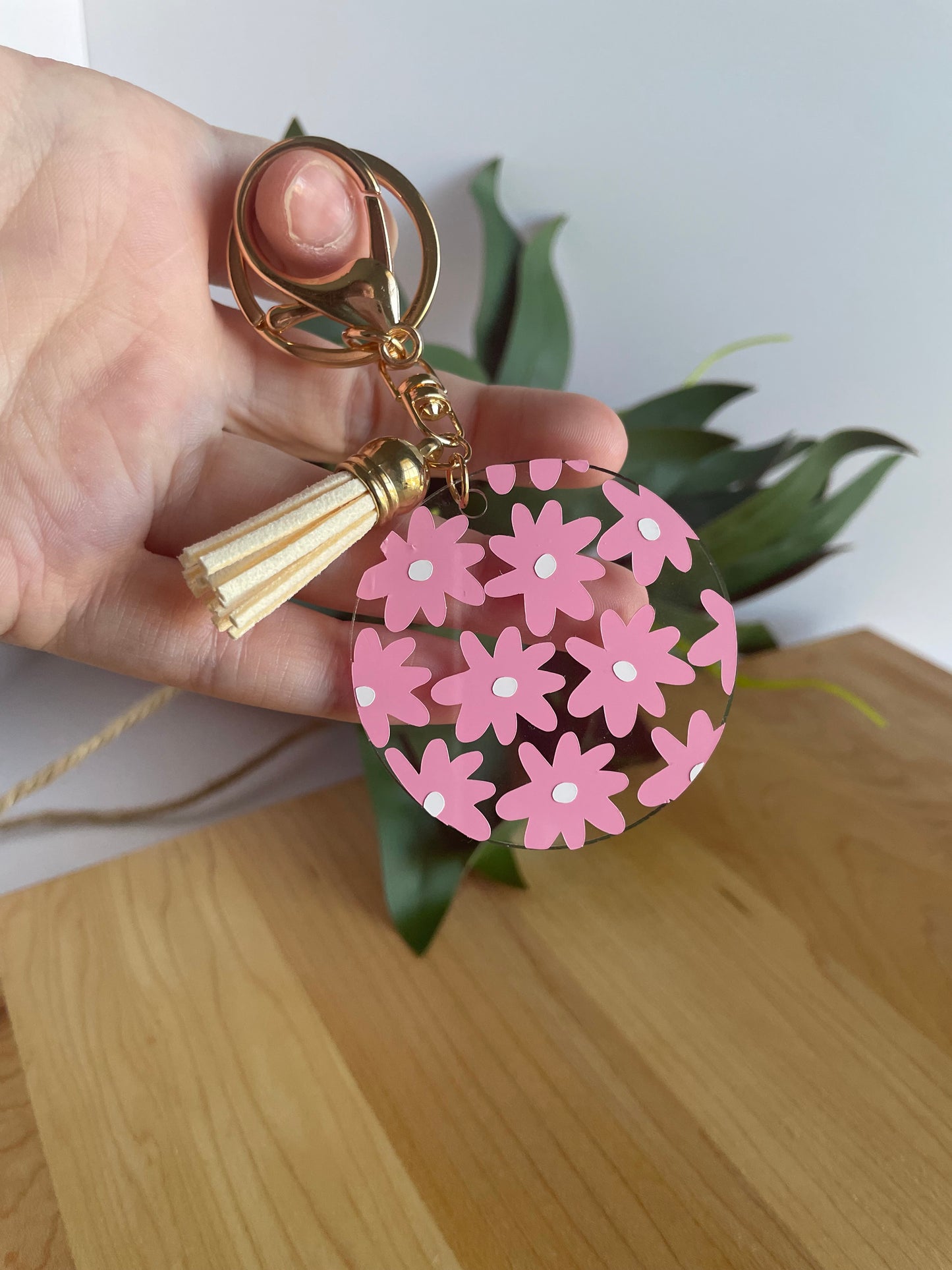 Pretty Pink Flowers Acrylic Keychain with a Cream Tassel and Gold Features