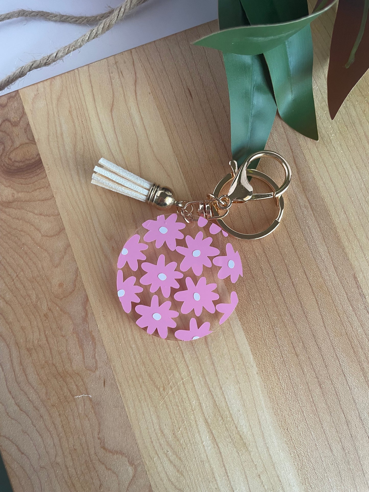 Pretty Pink Flowers Acrylic Keychain with a Cream Tassel and Gold Features