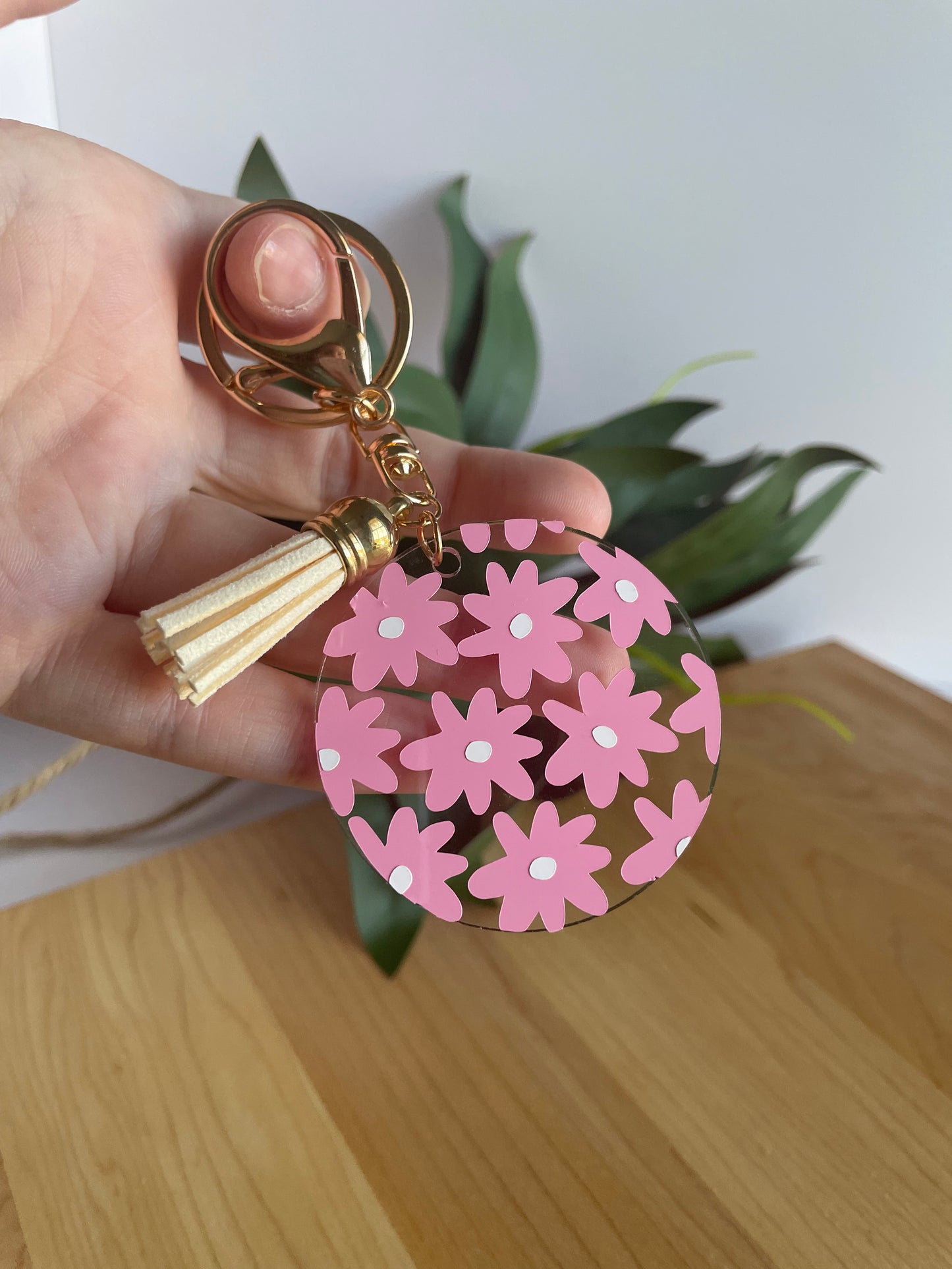 Pretty Pink Flowers Acrylic Keychain with a Cream Tassel and Gold Features