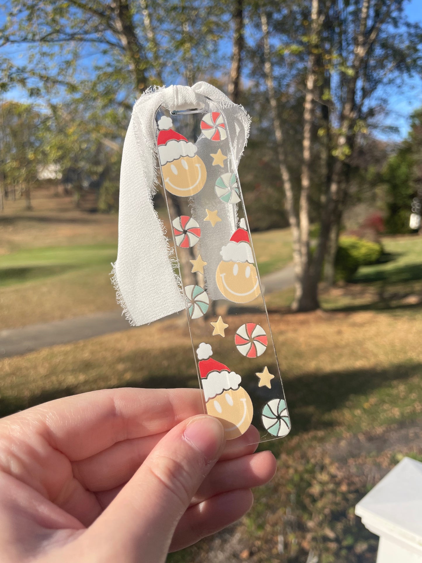 Santa Smiley Faces and Candies Clear Acrylic Bookmark with Chiffon Ribbon
