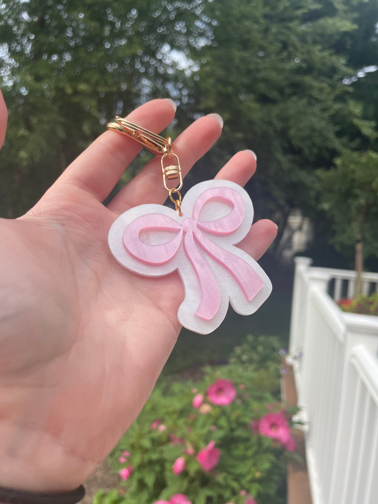 Pearlescent Pink and White Bow Keychain with Gold Features