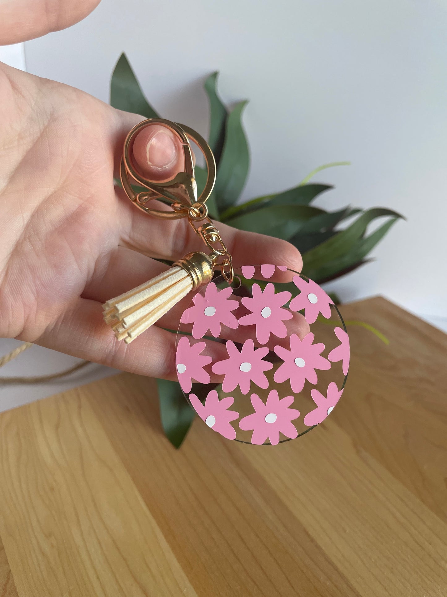 Pretty Pink Flowers Acrylic Keychain with a Cream Tassel and Gold Features