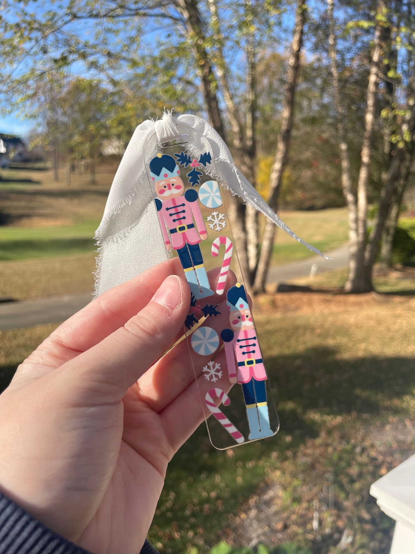 Blue Nutcrackers Holiday Clear Acrylic Bookmark with Chiffon Ribbon