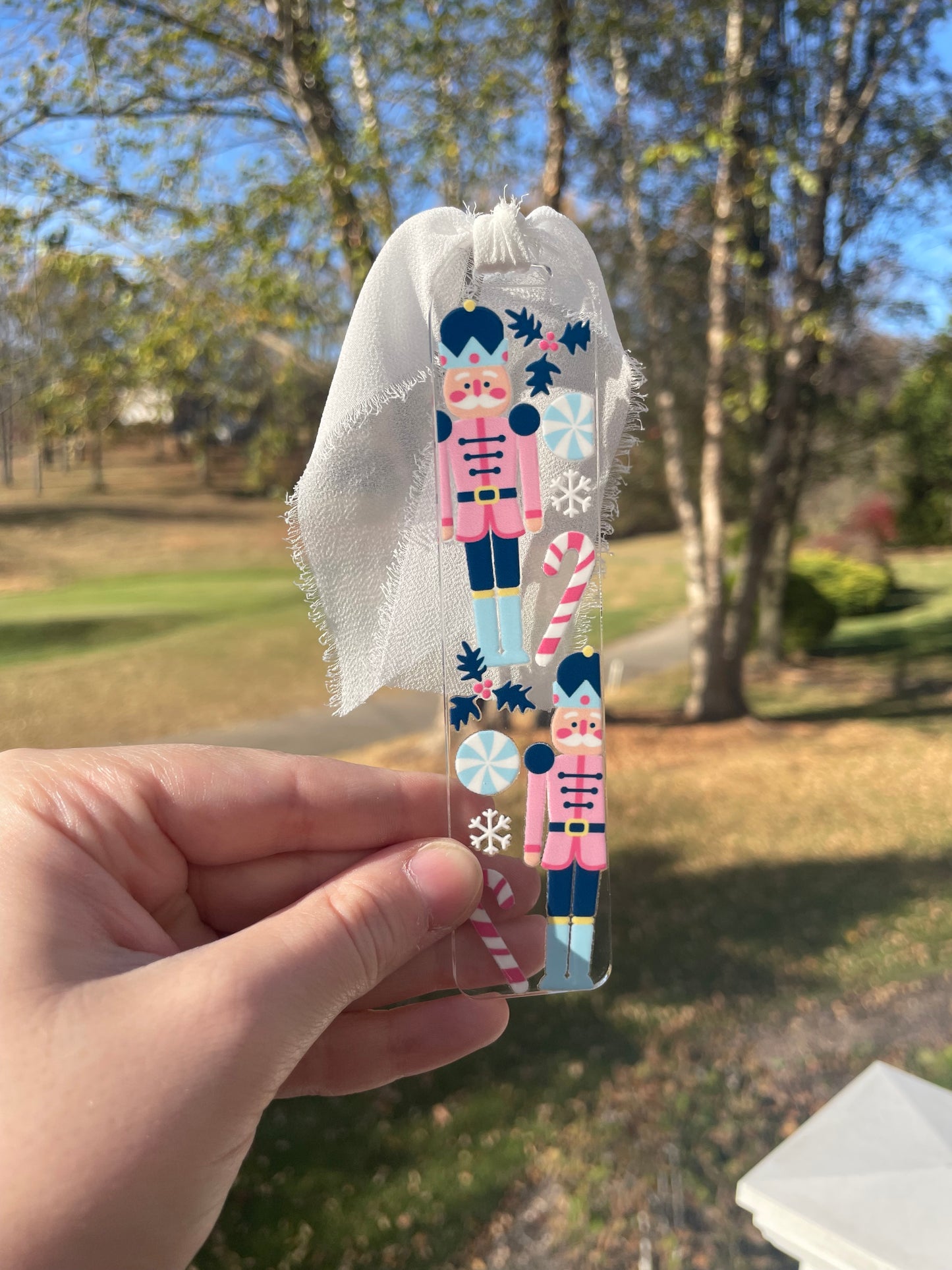 Blue Nutcrackers Holiday Clear Acrylic Bookmark with Chiffon Ribbon