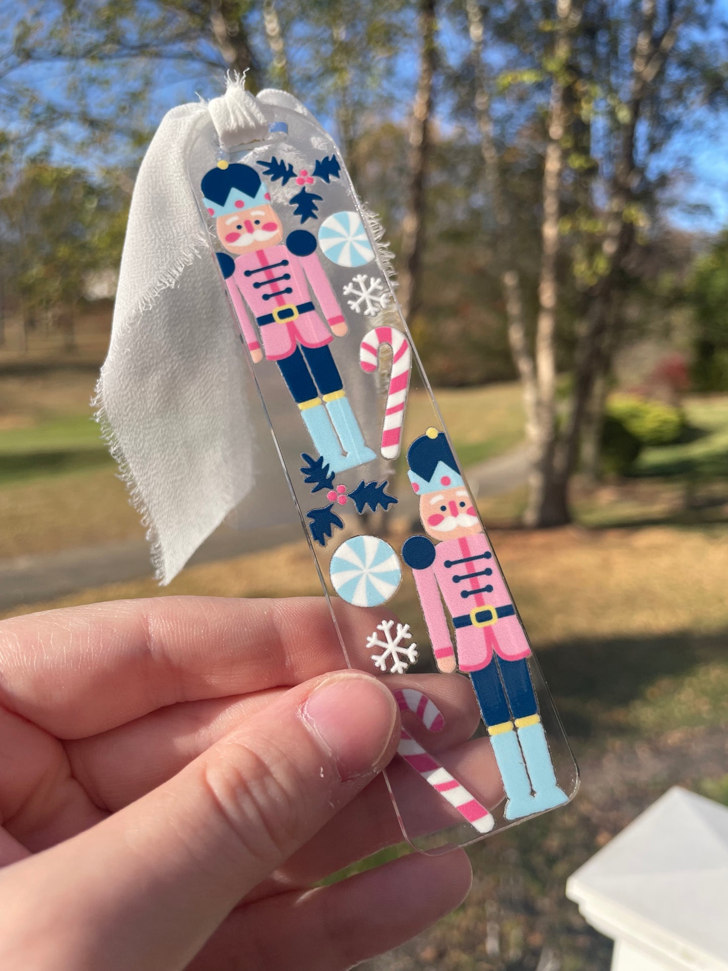 Blue Nutcrackers Holiday Clear Acrylic Bookmark with Chiffon Ribbon