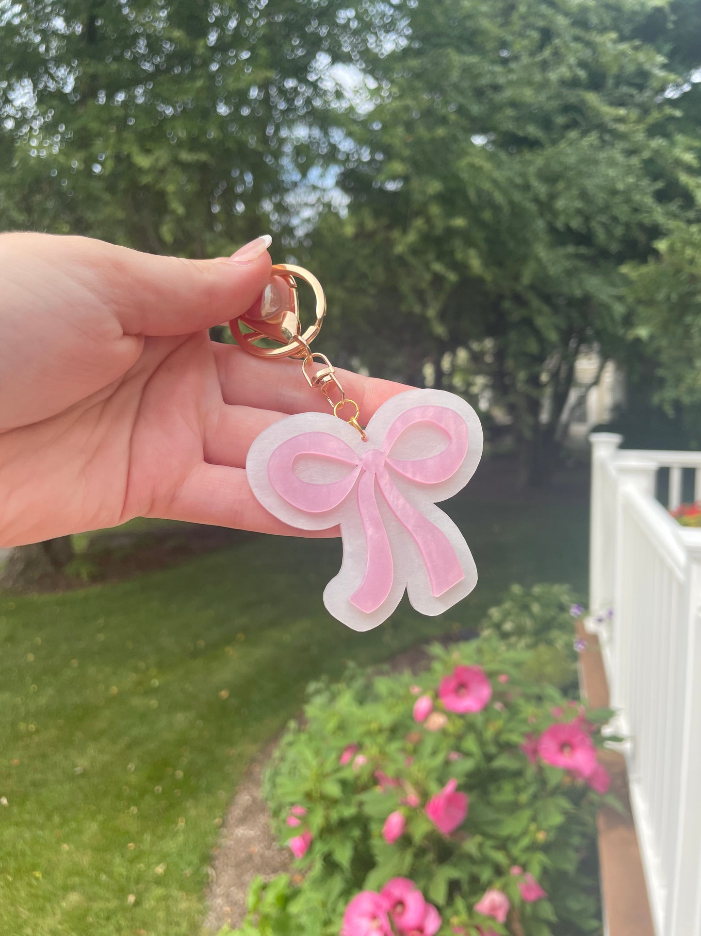 Pearlescent Pink and White Bow Keychain with Gold Features