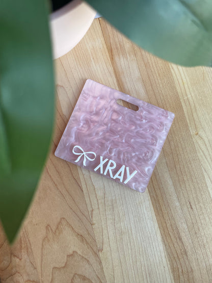 Pearl Pink with White Letters Badge Backer