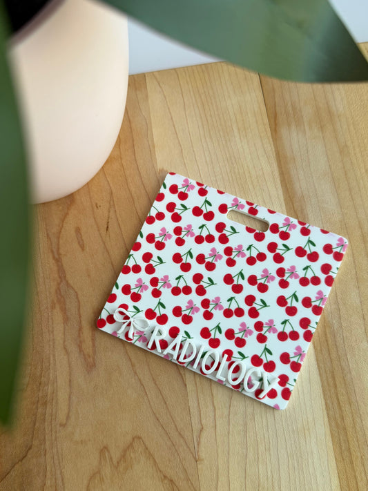 Cherries with a Bow Custom Acrylic Badge Backer