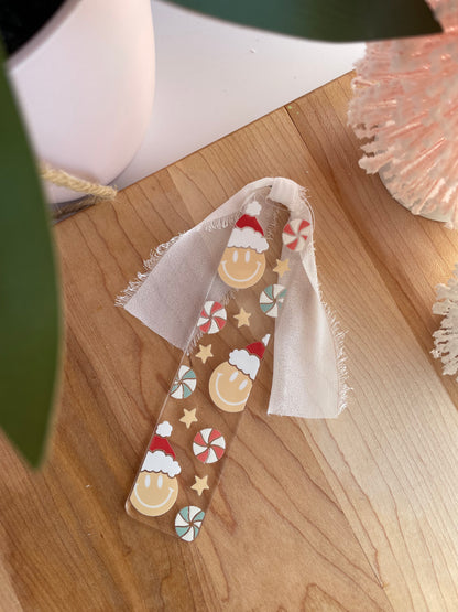 Santa Smiley Faces and Candies Clear Acrylic Bookmark with Chiffon Ribbon
