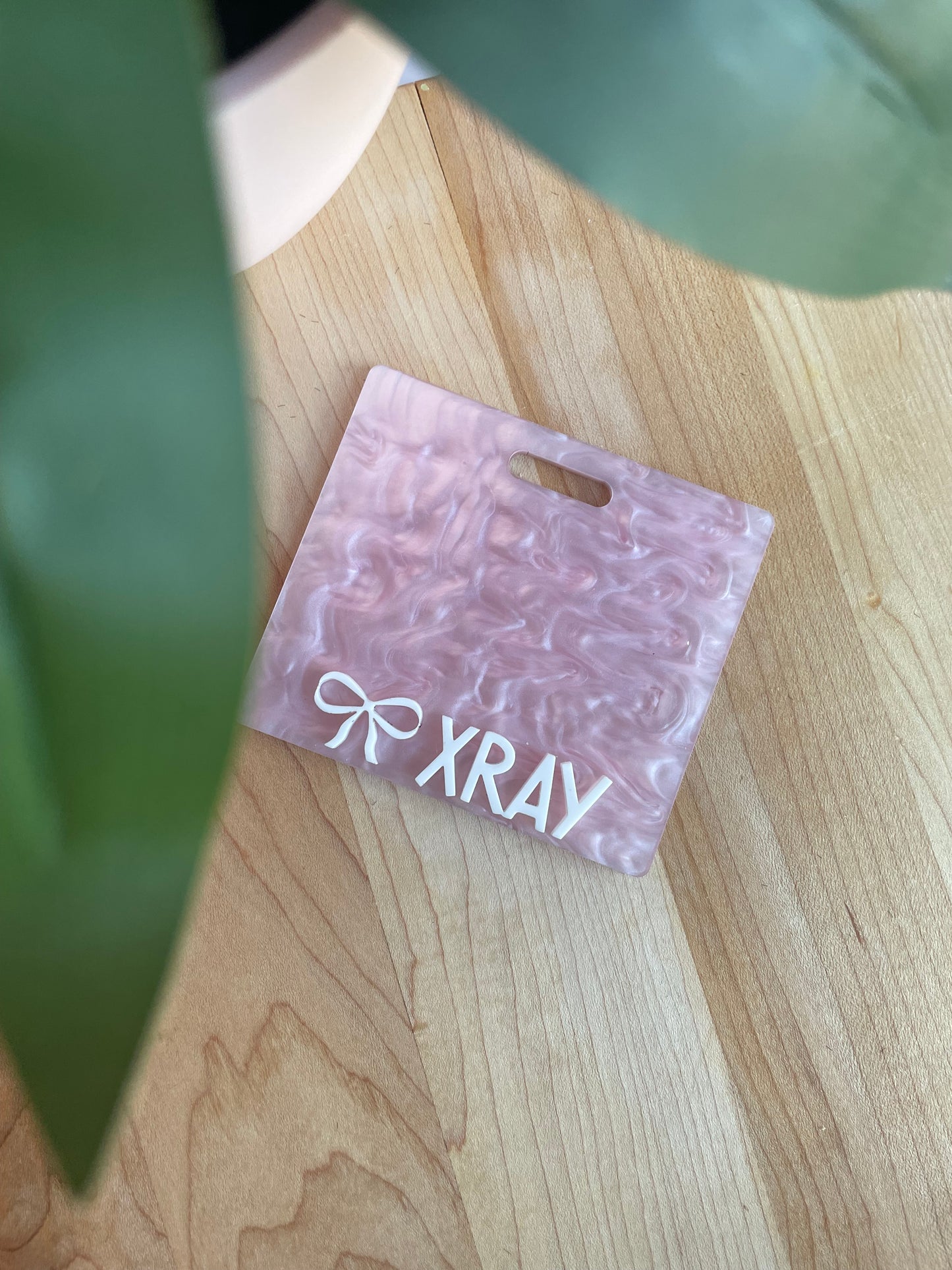 Pearl Pink with White Letters Badge Backer