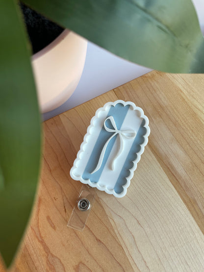 Scalloped Blue Stripe Bow Badge Reel