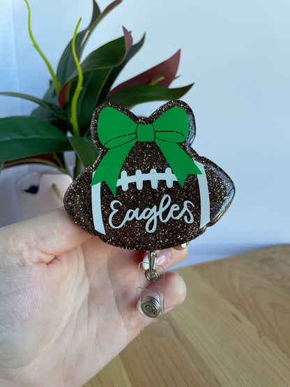 Eagles Glittery Football and Bow Acrylic Badge Reel