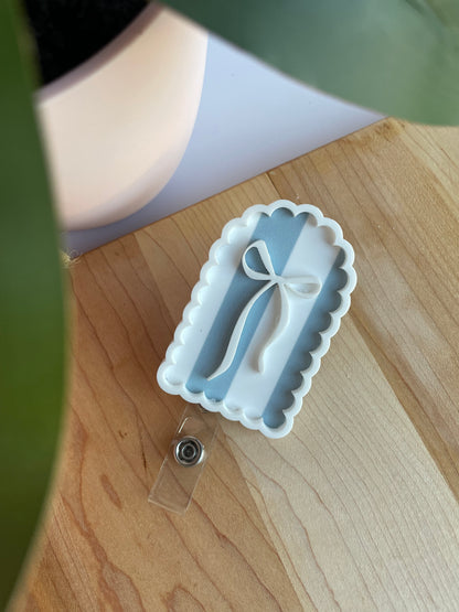 Scalloped Blue Stripe Bow Badge Reel