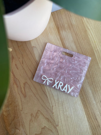 Pearl Pink with White Letters Badge Backer