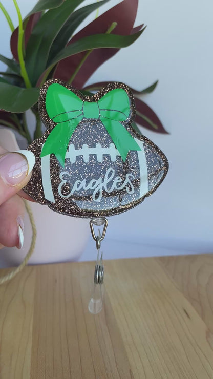 Eagles Glittery Football and Bow Acrylic Badge Reel